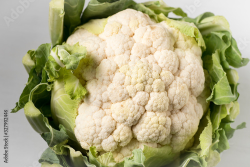 Raw cauliflower on a table ready to be cleaned and cooked. Tasty vegetables