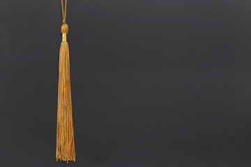 gold graduation tassel