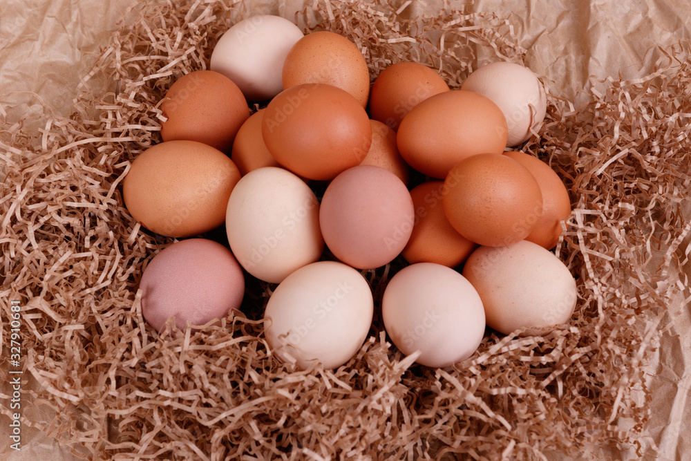 Village eggs. Kraft paper background