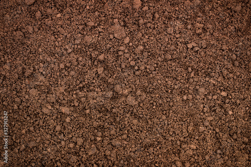 brown earth surface, top view. organic soil texture photo