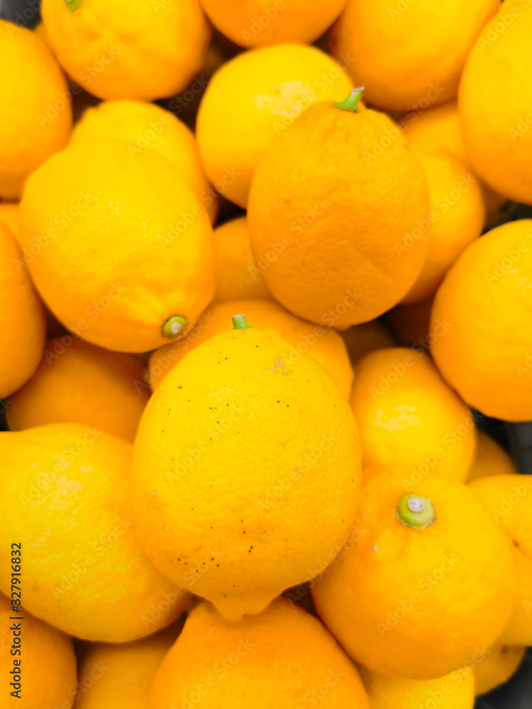 Beautiful texture fresh lemon orange lime tangerine and grapefruit background, fruit orange pattern Beautiful texture fresh lemon orange lime tangerine and grapefruit background, fruit orange pattern