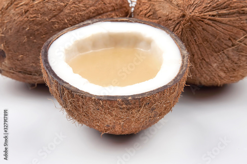 Coconut with milk cut on a white background. vitamin fruits. healthy food
