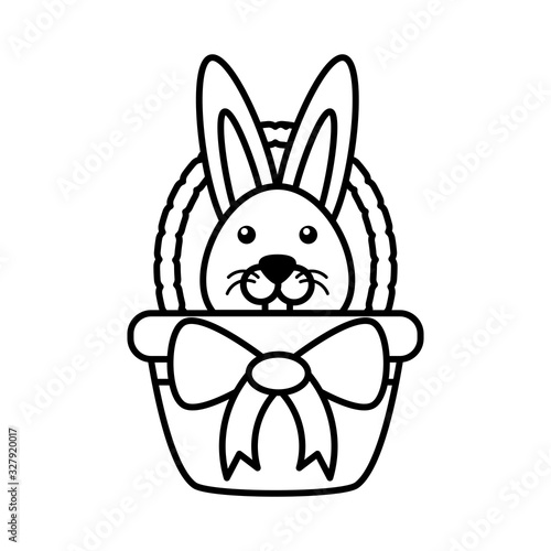 wicker basket with cute rabbit on white background
