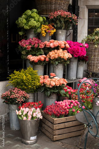 variety of colors near the Liberty store in London. Large bouquets in tin vases.