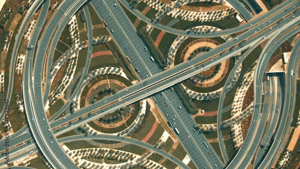 Aerial top down view of a big highway interchange traffic in Dubai, UAE Aerial top down view of a big highway interchange traffic in Dubai, UAE