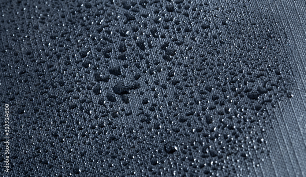 Obraz premium macro grey nylon with water drops, nylon fabric textured background closeup