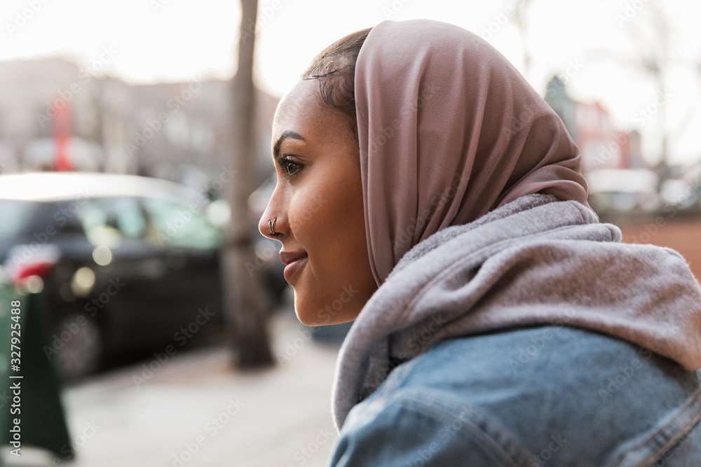 Close up profile portrait young woman with nose ring wearing hijab on Stock  Photo | Adobe Stock