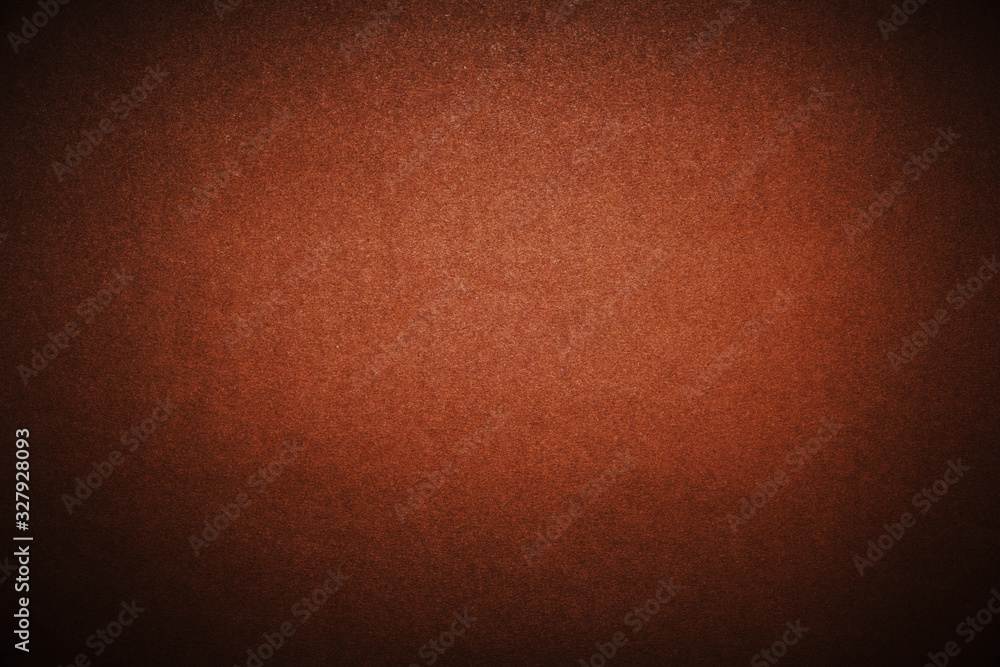 Fototapeta premium Bright brown background with vignetting. The texture of the cardboard.