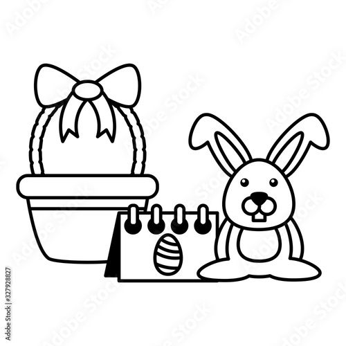 wicker basket with cute rabbit on white background
