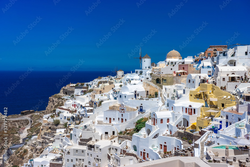 Iconic view of Oia town with windmills. Thira (Santorini)
