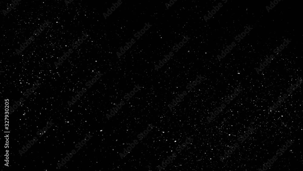Mist of falling snow particles isolated on black background Mist of falling snow particles isolated on black background