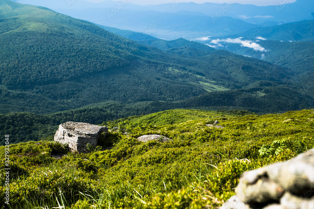 Fototapeta premium mountain landscape. background of mountain stones from the top. summer tourism