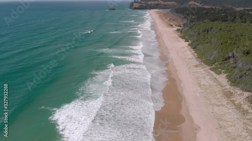 Aerial shot of a beautiful surf beach in the Coromandel, New Zealand photo