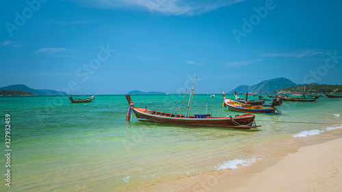 Fototapeta Naklejka Na Ścianę i Meble -  Wooden Boat With Tropical Sea Scenery