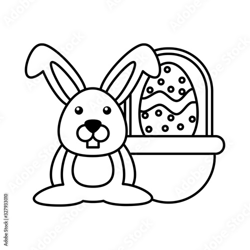 wicker basket with cute rabbit on white background