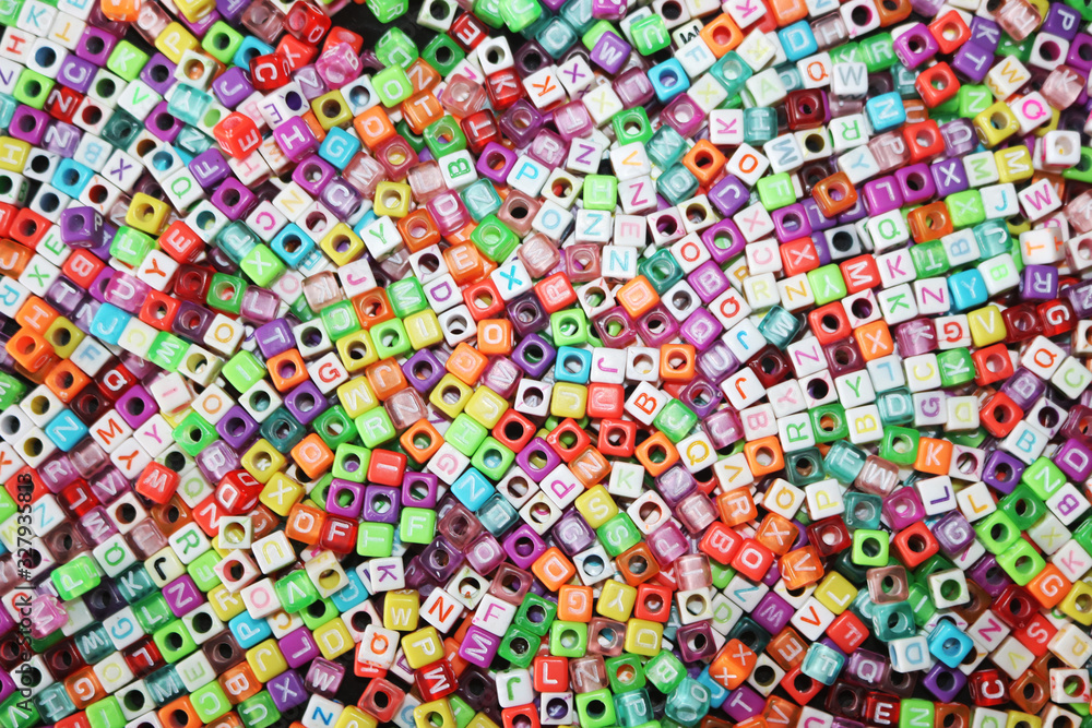 top view of colorful dices, cubes with a to z letters on it