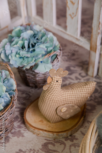 Happy Easter - Easter  natural decorations with floral garldand and chicken on a wooden background photo