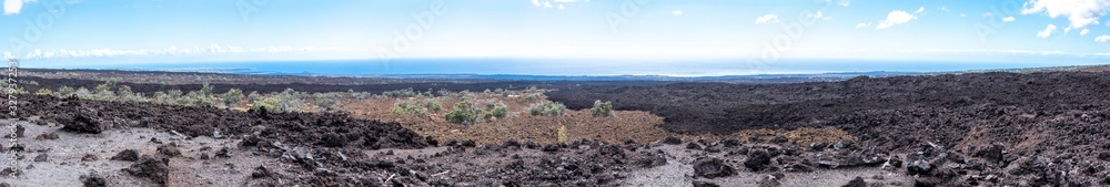 Panoramic view of volcanic rocks in the south of Big Island Hawaii