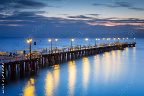 Wallpaper Mural Beautiful landscape with wooden pier in Gdynia Orlowo at sunrise, Poland Torontodigital.ca