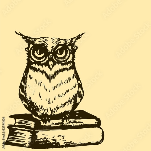 A smart owl with glasses sits on a stack of books.
