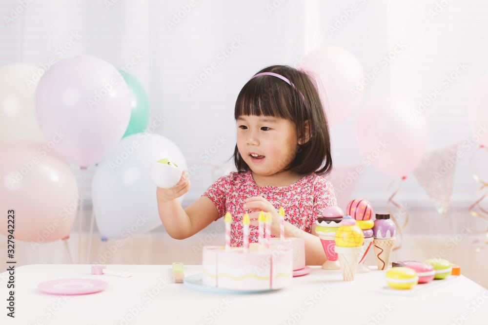 toddler girl pretend play food preparing role at home against white background toddler girl pretend play food preparing role at home against white background