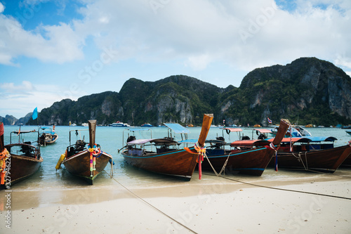 Beautiful view of long tail boats in thailand island Phi Phi