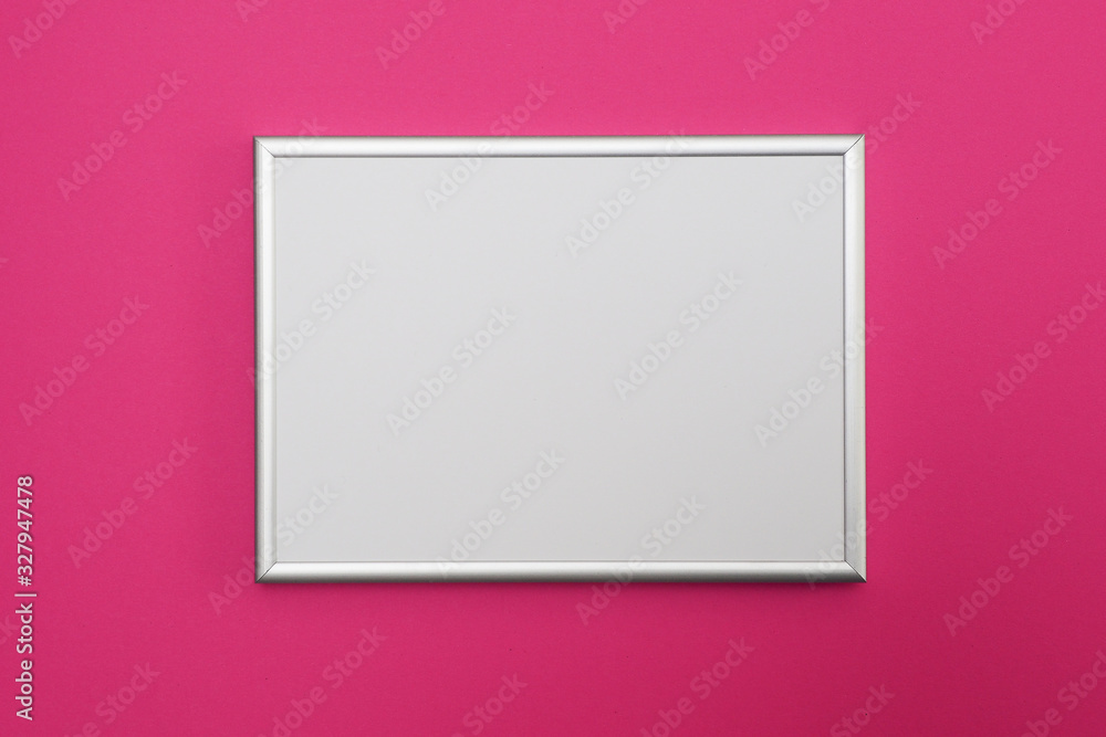 Photo frame on pink paper background Photo frame on pink paper background