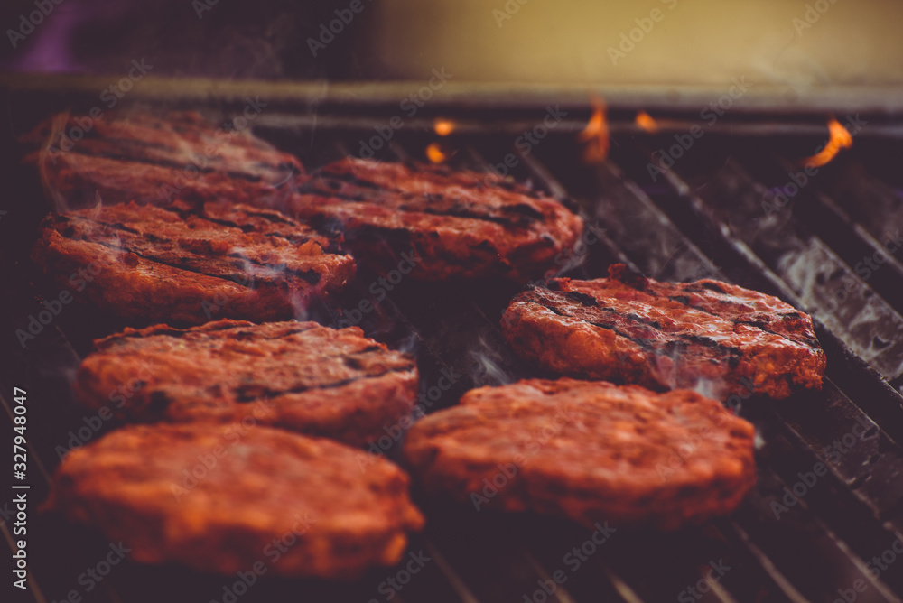 Hamburger meat on a grill, Bbq Concept Hamburger meat on a grill, Bbq Concept