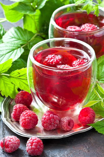 Raspberry beverage with berries, selective focus
