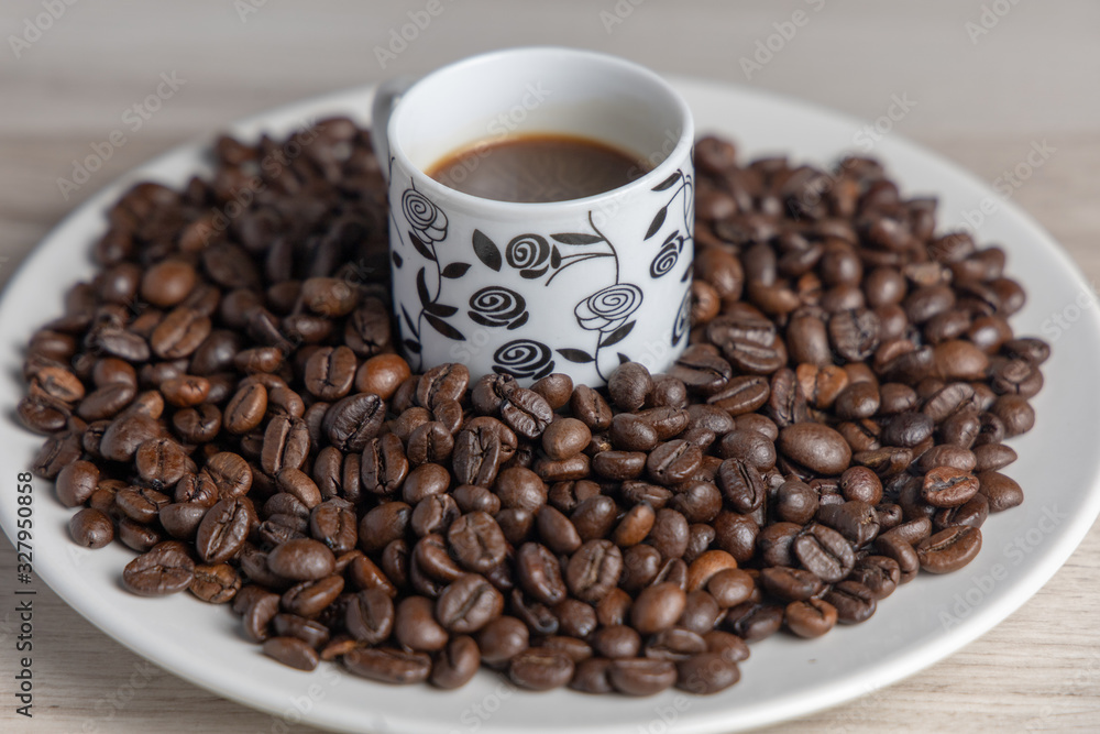 Coffee on plate and cup seen from above ready to drink Coffee on plate and cup seen from above ready to drink