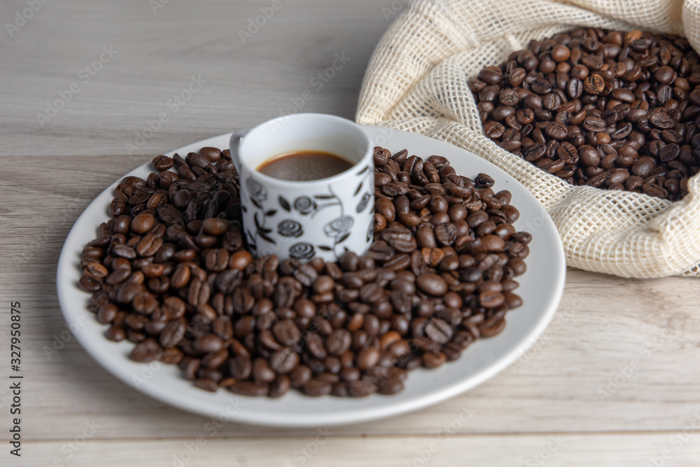 Coffee on plate and cup seen from above ready to drink Coffee on plate and cup seen from above ready to drink