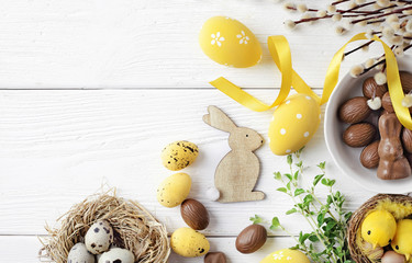 colorful easter eggs and spring flowers