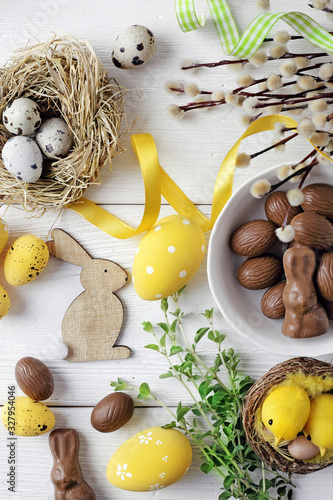 colorful easter eggs and spring flowers