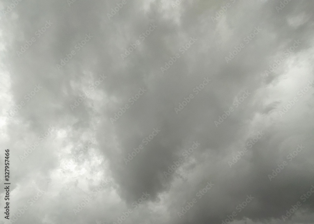 Sky with gray clouds, background, thunderclouds, unstable changeable weather. Sky before the rain. Sky with gray clouds, background, thunderclouds, unstable changeable weather. Sky before the rain.