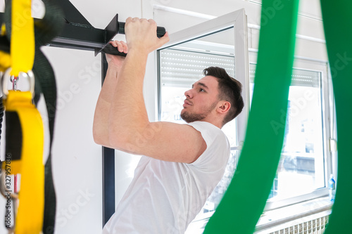 young man training at the gym