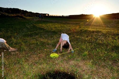 boy playing in the field