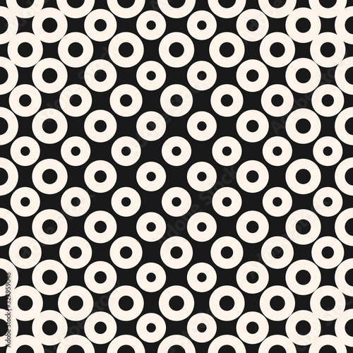 Vector geometric halftone seamless pattern with circles, dots, mesh. Abstract monochrome texture. Black and white background with radial gradient transition. Optical illusion effect. Modern design