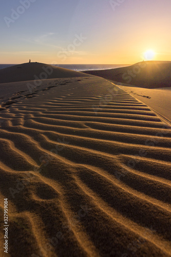 Sunset at Dunes of Maspalomas in Gran Canari  Canary Islands 