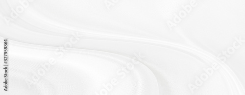 White gray satin texture that is white silver fabric silk panorama background with beautiful soft blur pattern natural.