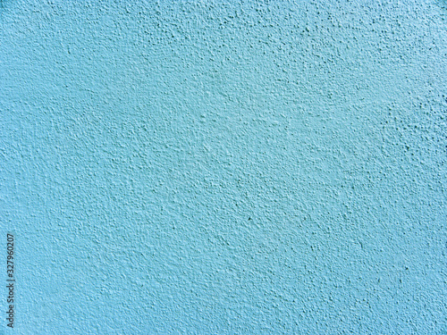 Blue color painted on concrete wall texture background. Blue color concrete wall background 