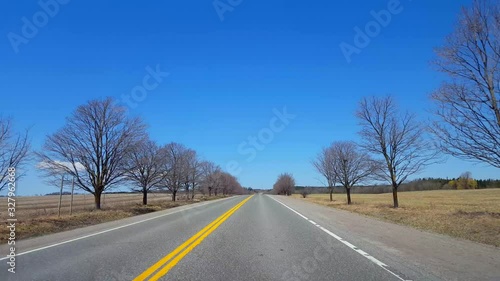 Wallpaper Mural *Fast Motion* Collage of Driving on Rural Road in Day and Winter and Sunset and Snowing.  Driver Point of View POV Variety Collection Country Street Spring and Summer and Snow Travel and Transportatio Torontodigital.ca