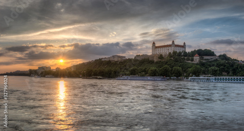 Photography Colorful Sunset in the Flooded City with the Castle on the Hill and Ships on the
