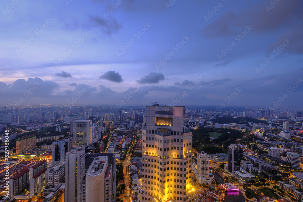 high angle view of illuminated singapore financial buildings 