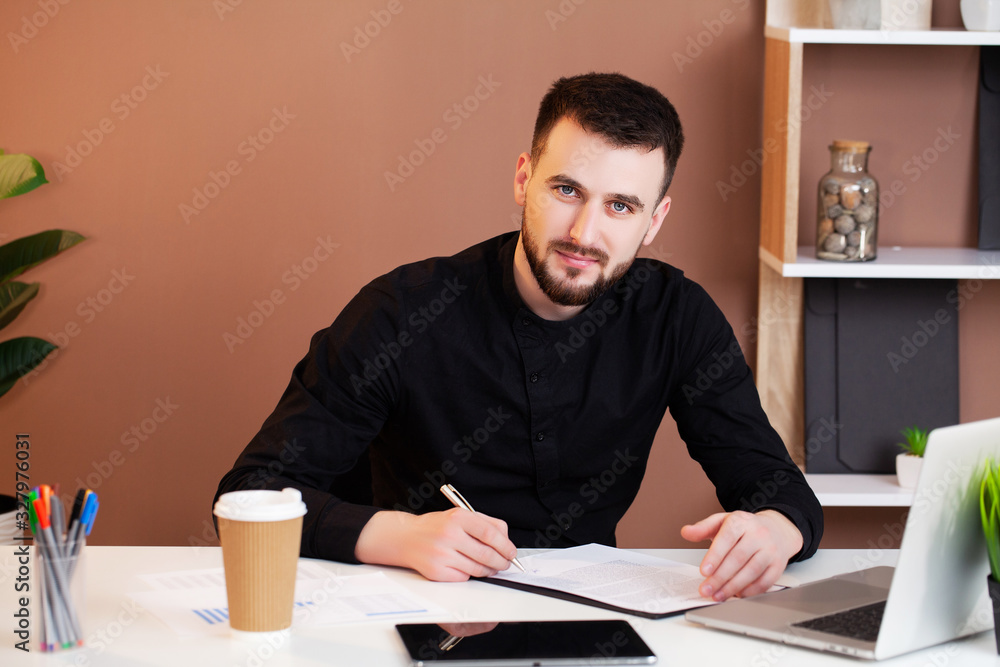 Man working at the office on laptop. Man working at the office on laptop.