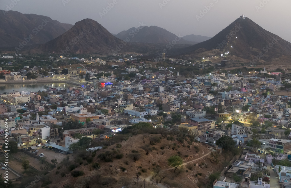 Fototapeta premium Pushkar,Rajasthan,India,viewed at dusk from the hilltop at Gayatri temple.