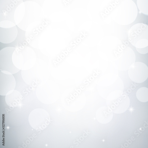 White and grey bokeh effect, Winter snowy background, Abstract blurred vector backdrop.
