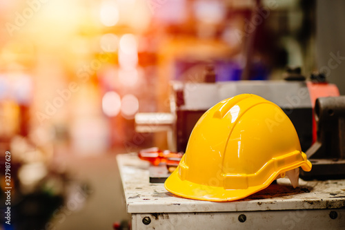 фотографія yellow helmet hardhat safety for factory worker working in danger workplace with space for text