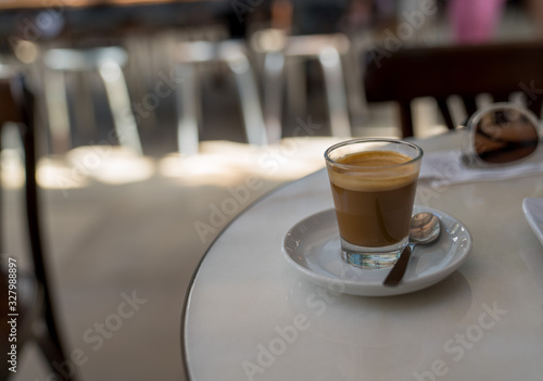 Expresso coffee drink sitting on counter in diner