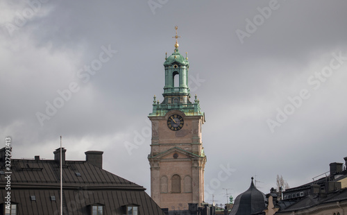 Photography The tower of the church Storkyrkan  or Sankt Nicolai kyrka and roofs in the old