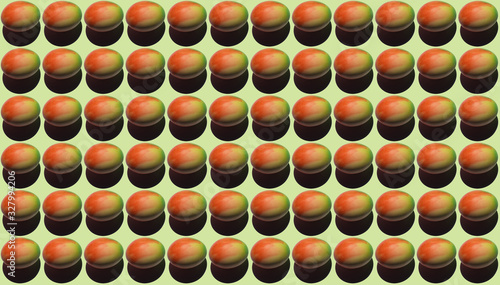 Pattern of multi-colored eggs on a pastel green background. Minimal food concept.
